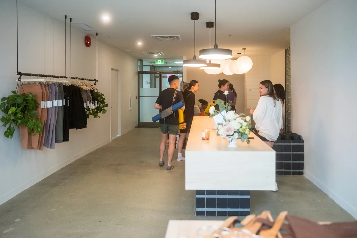 The 124 Street reception area with the front desk and studio beyond.