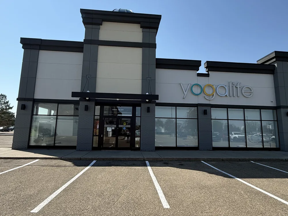 The Yogalife South storefront at 2065 98 Street, with parking directly in front of the studio.